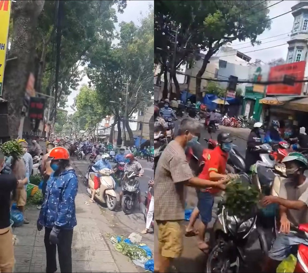  
Tiệm rau lề đường ở Thành phố Hồ Chí Minh chật kín người đến mua. (Ảnh: Chụp màn hình)