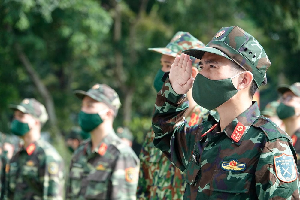  
Sự quyết tâm thể hiện rõ ràng trên gương mặt của các chiến sĩ. (Ảnh: VietNamNet)