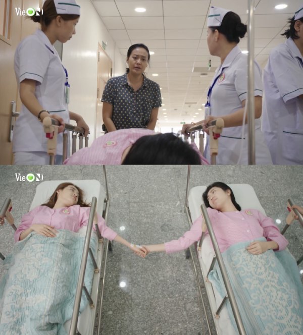  
Chị Hạnh đưa Châu và Báu tới phòng phẫu thuật. (Ảnh: Vie Channel)
