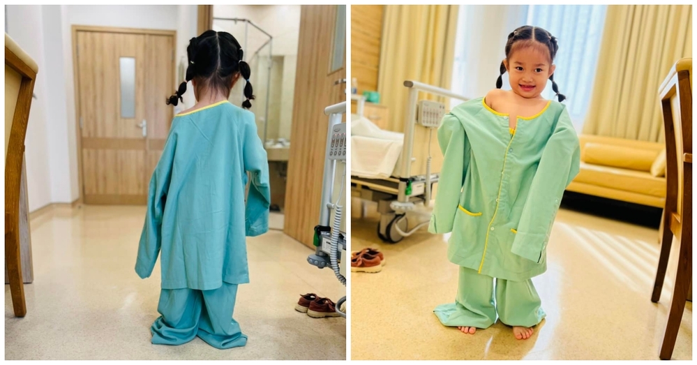  
Cô bé vẫn tạo đủ kiểu dáng hài hước khi mặc trang phục của bệnh viện. (Ảnh: FBNV) - Tin sao Viet - Tin tuc sao Viet - Scandal sao Viet - Tin tuc cua Sao - Tin cua Sao