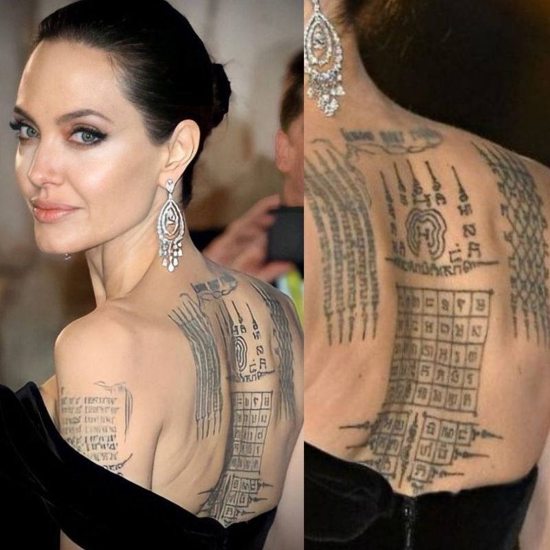  Angelina Jolie has tattoos covering almost all of her back. (Photo: Pinterest)