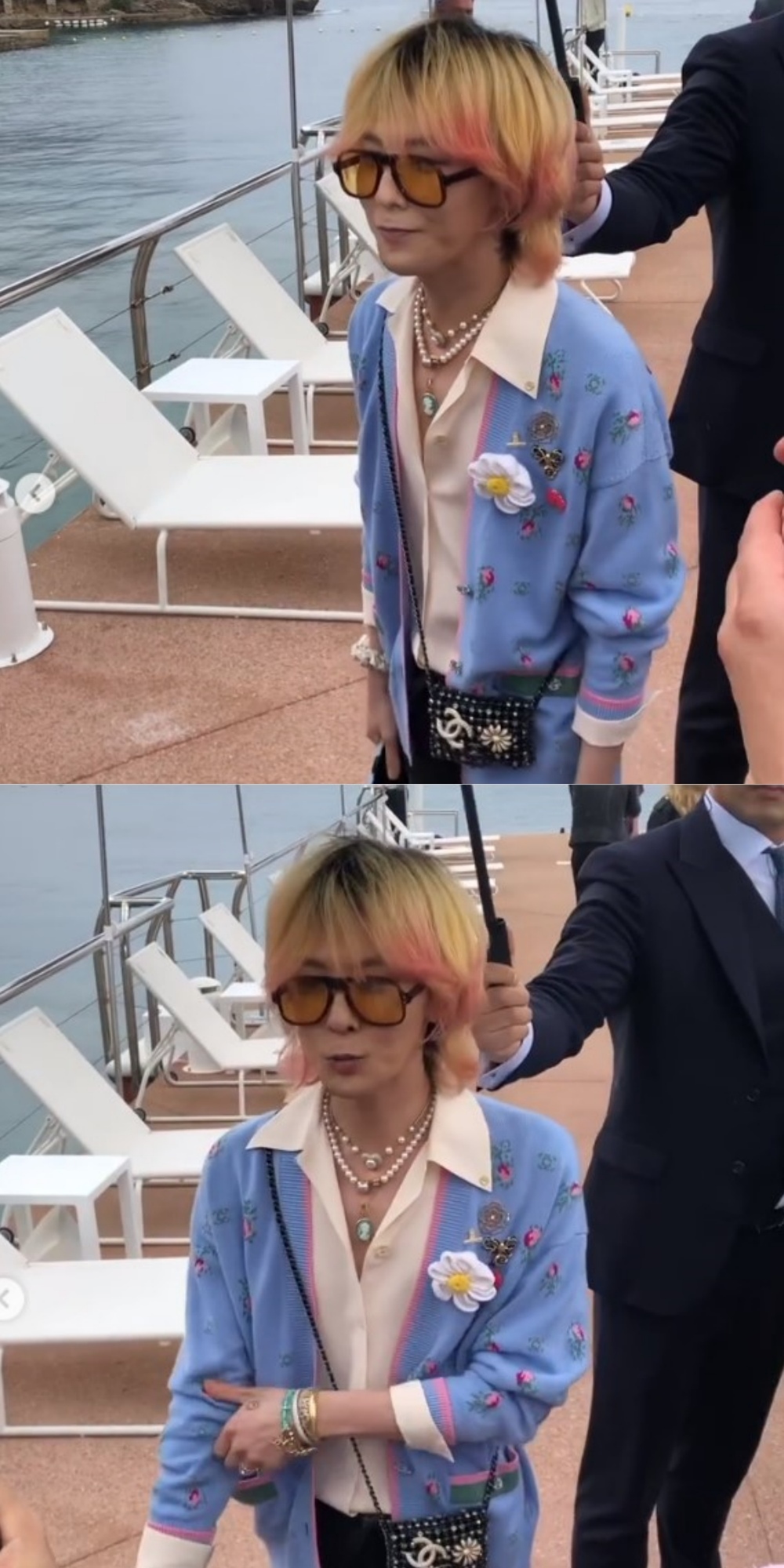 Nam thần tượng được nhân viên của Chanel chăm sóc tận tình, che dù khi trời mưa. (Ảnh: Instagram @jdiderich)