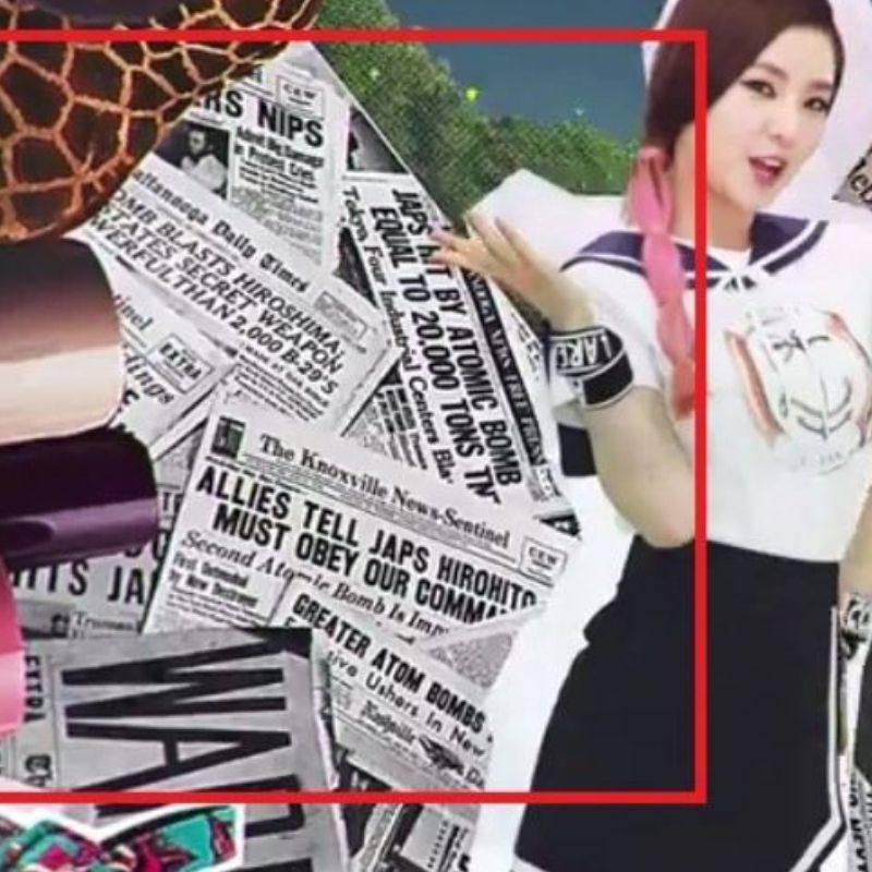 Những tờ báo có tựa đề gợi nhắc chiến tranh. (Ảnh: Chụp màn hình YouTube SM Stown)