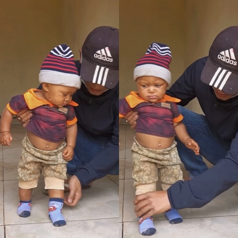  
Quang Linh dạy Paulo tập đi những bước đầu tiên. (Ảnh: Chụp màn hình YouTube Quang Linh Vlogs)