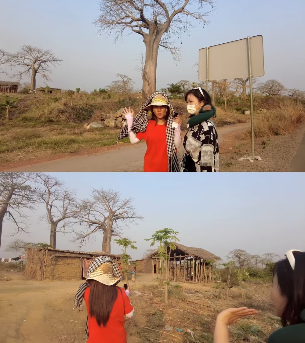  
Đức Nhân ghé thăm một bản làng nhỏ trên đường đến thủ đô Luanda của Angola. (Ảnh: Chụp màn hình YouTube Vợ Chồng Nhà Nhân)