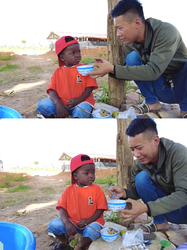  Cậu bé vẫn hoang mang với món mới này. (Ảnh: Chụp màn hình Quang Linh Vlogs - Cuộc Sống ở Châu Phi)