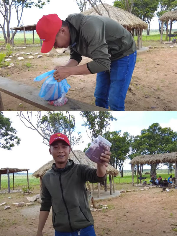  Quang Linh mang mắm tôm đến giới thiệu với dân bản. (Ảnh: Chụp màn hình Quang Linh Vlogs - Cuộc Sống ở Châu Phi)