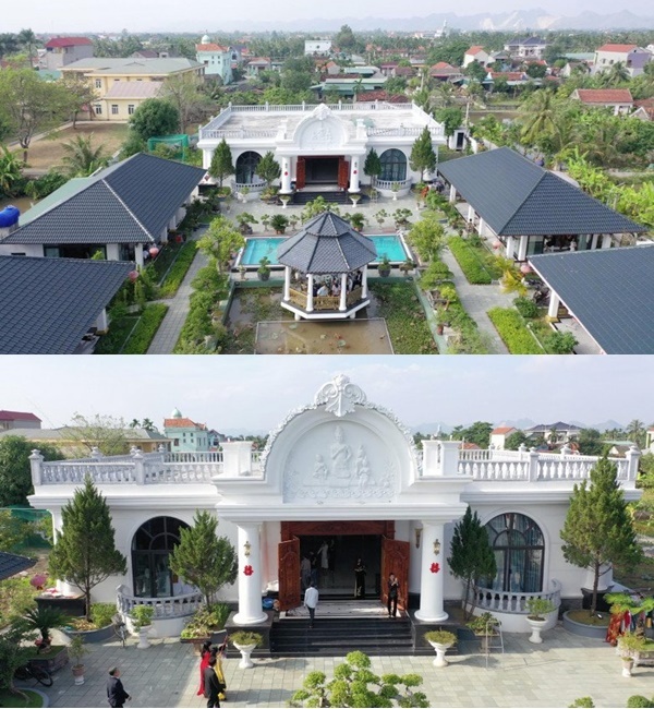 
Bức phù điêu Mai An Tiêm đặt trước căn nhà màu trắng. (Ảnh: Người Đưa Tin)