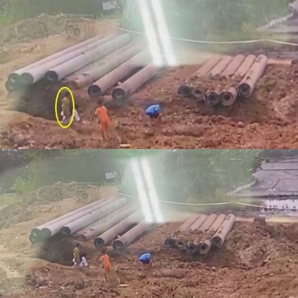 Hình ảnh bé N. (áo vàng) trước khi lọt hố. (Ảnh: Người Lao Động)