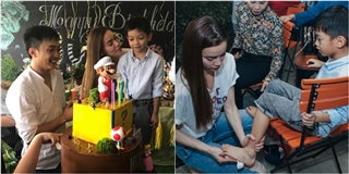 Hồ Ngọc Hà cúi người lau chân cho Subeo trong sinh nhật 7 tuổi