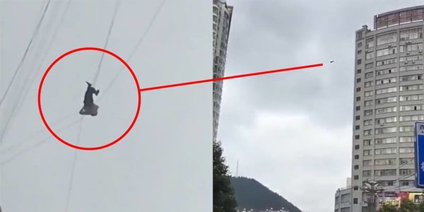 Đây không phải xiếc đu dây, mà là chiêu quỵt tiền khách sạn liều lĩnh và bán mạng nhất của nhân loại