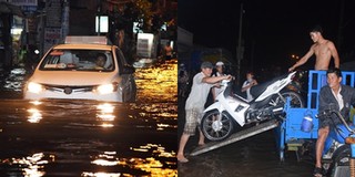 Chùm ảnh: Người Sài Gòn dắt xe “bơi” về nhà trong đợt triều cường ngập gần 1m