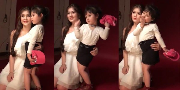 Bé gái tạo 1001 dáng trước ống kính như siêu mẫu khiến chị gái hot girl bị "bơ đẹp"