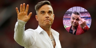 Hé lộ nguyên nhân đằng sau hành động giơ ngón tay thối của nam ca sĩ Robbie Williams