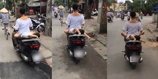 Cư dân mạng phẫn nộ với người mẹ "đèo con" phía sau xe máy một cách cực kì nguy hiểm