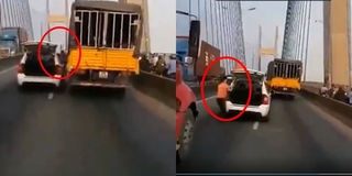 Clip: Va chạm trên cầu, tài xế xe con hùng hổ lao xuống đuổi đánh tài xế xe tải