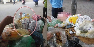 Hình ảnh bé sơ sinh bụ bẫm "bị bỏ quên" trên xe rác tại Hà Nội khiến CĐM xôn xao