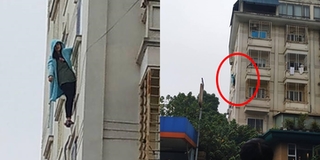 Thót tim cảnh cô gái trẻ đánh đu trên lan can tầng 3, liên tục kêu cứu tại Hà Nội