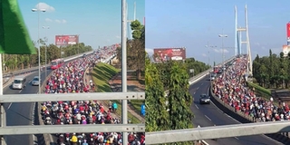 Biển người đổ về TP.HCM sau kì nghỉ Tết: Người dân mệt mỏi "chôn chân" trên cầu Mỹ Thuận giữa trưa