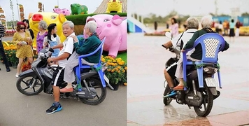 "Đường hoa năm nay đẹp lắm, để con chở mẹ đi... mẹ nhé!" "Đường hoa năm nay đẹp lắm, để con chở mẹ đi... mẹ nhé!"