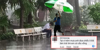 Chú bảo vệ cầm dù che mưa cho thanh niên thất tình