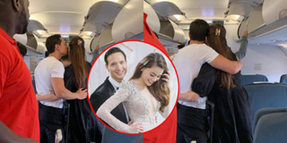 Kim Lý ôm hôn Hà Hồ trên máy bay khiến hành khách trố mắt