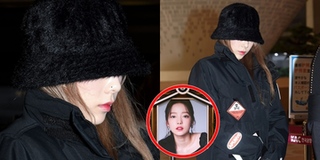 Taeyeon mặc đồ đen che kín mặt ở sân bay sau ngày Goo Hara qua đời