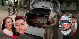 Vợ Lê Dương Bảo Lâm "bế" bụng bầu, tự lái xe đi phát quà trong đêm