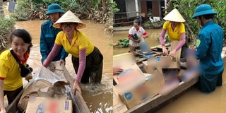 Trang Trần vượt dòng nước lũ, lội bộ để đẩy xuồng thức ăn cho bà con