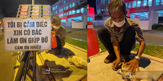 Bạn trẻ Sài Gòn ghé thăm cụ ông bán vé số khuyết tật và chú chó nhỏ