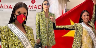 Á hậu Kim Duyên mang theo cờ Việt Nam trong ngày đầu Miss Universe