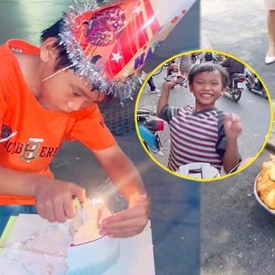 Cậu bé bán bánh mì ngủ trên vỉa hè được tổ chức sinh nhật ở đường phố
